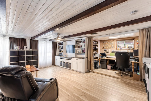 living room with ceiling fan, light wood-type flooring, and plenty of natural light