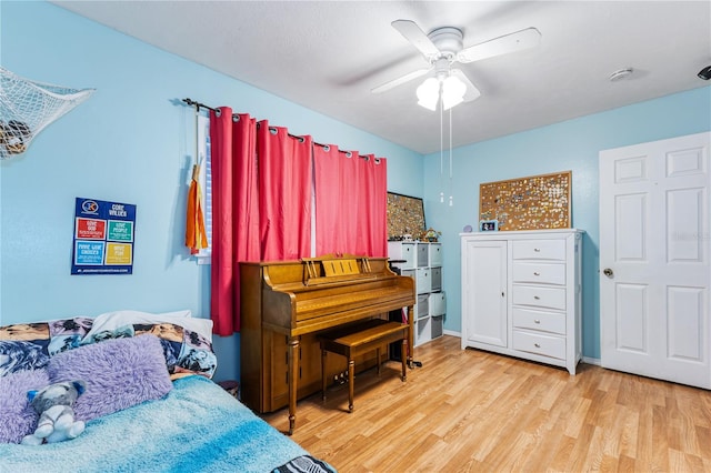 interior space featuring light wood-type flooring and ceiling fan