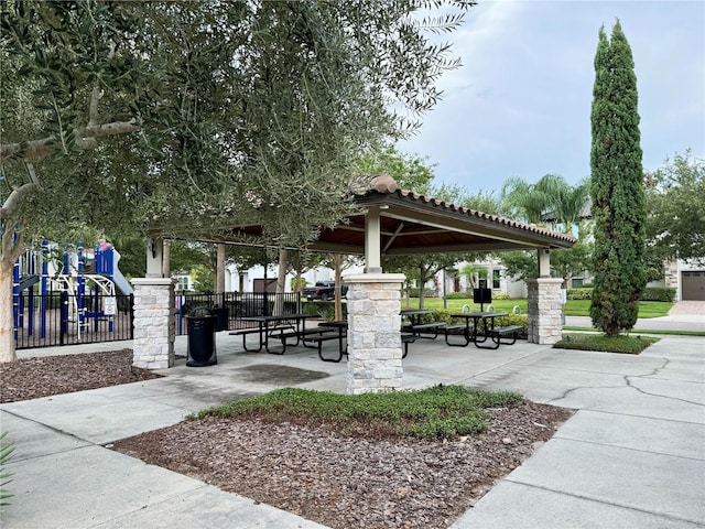 surrounding community with a gazebo and a playground