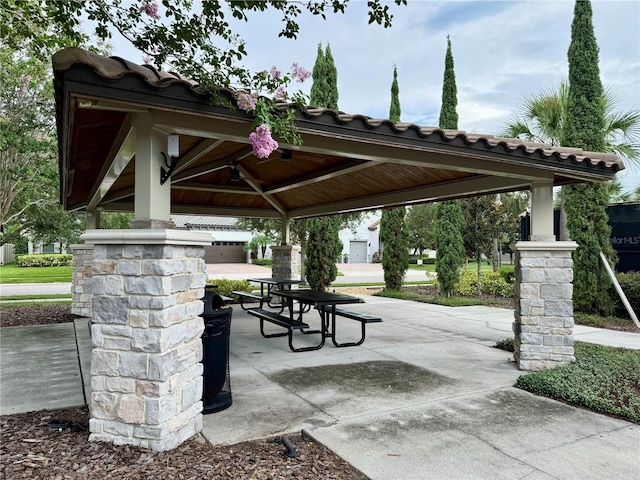 surrounding community with a gazebo and a patio