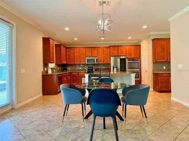 kitchen featuring decorative backsplash, light tile patterned flooring, ornamental molding, and appliances with stainless steel finishes