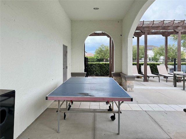 view of patio / terrace with a mountain view and a pergola