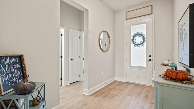 foyer entrance featuring light hardwood / wood-style floors