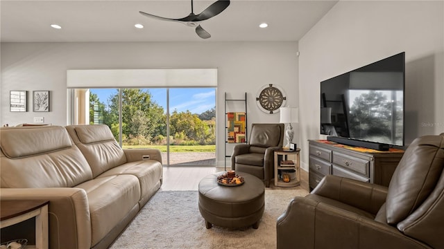 living area with wood finished floors, ceiling fan, and recessed lighting