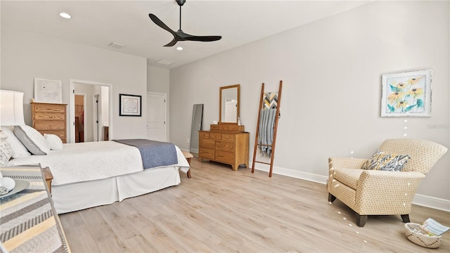 bedroom featuring light hardwood / wood-style floors and ceiling fan