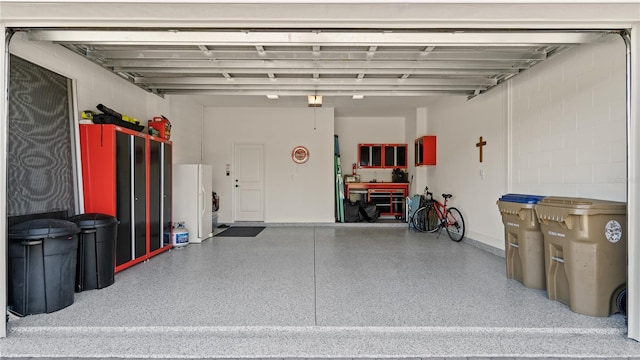 garage featuring freestanding refrigerator