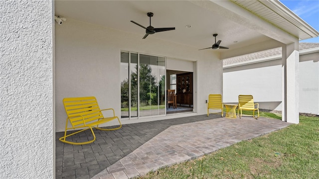 view of patio with ceiling fan