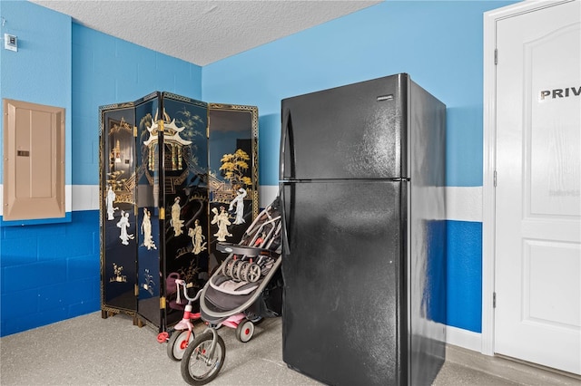 1473 Moon Valley Dr, Davenport, FL 33896 - miscellaneous room featuring electric panel and a textured ceiling