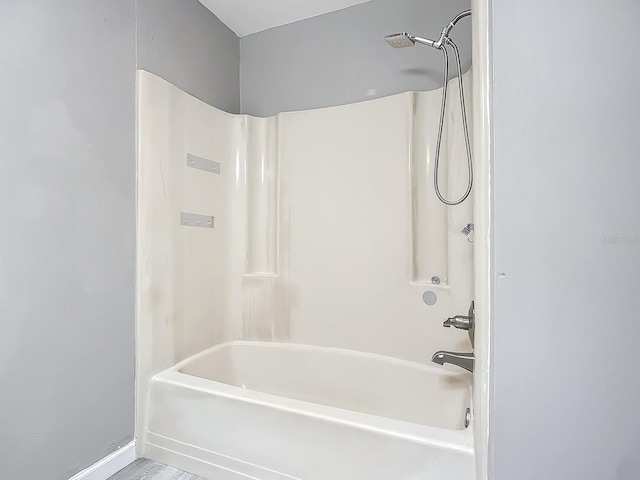 bathroom featuring bathing tub / shower combination