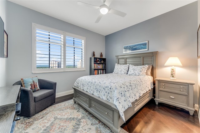 bedroom featuring dark wood-type flooring and ceiling fan