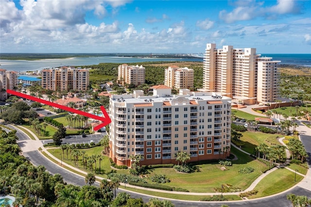 drone / aerial view with a water view