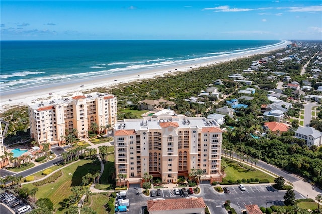 aerial view featuring a view of the beach and a water view