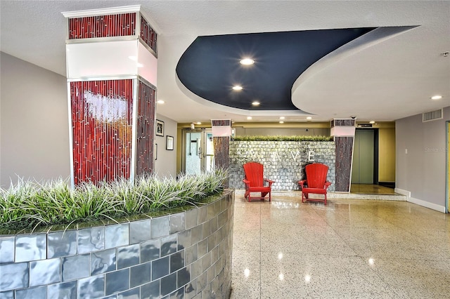 community lobby featuring visible vents