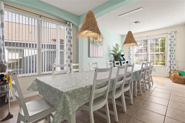 1055 Lake Berkley Dr, Kissimmee, FL 34746 - dining room with tile patterned floors