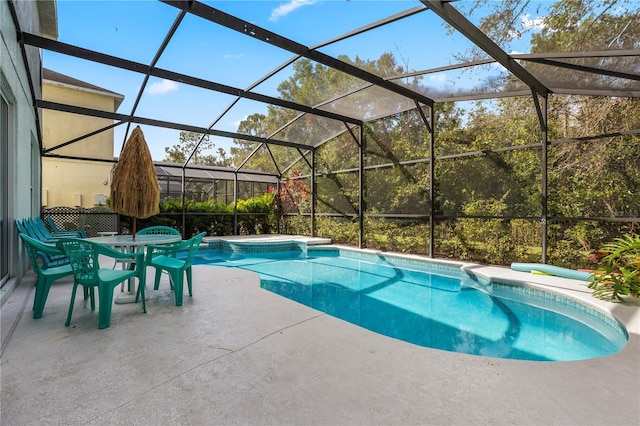 1055 Lake Berkley Dr, Kissimmee, FL 34746 - outdoor pool featuring a hot tub, a patio, and a lanai