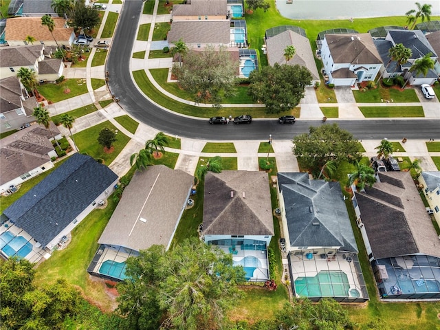 1055 Lake Berkley Dr, Kissimmee, FL 34746 - aerial perspective of suburban area with a pool