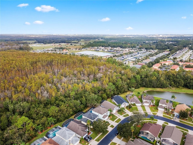 1055 Lake Berkley Dr, Kissimmee, FL 34746 - aerial view of property and surrounding area featuring a large body of water and nearby suburban area