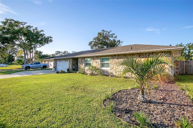 ranch-style house with a front lawn and a garage