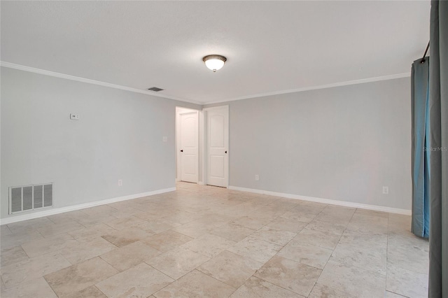 spare room featuring ornamental molding