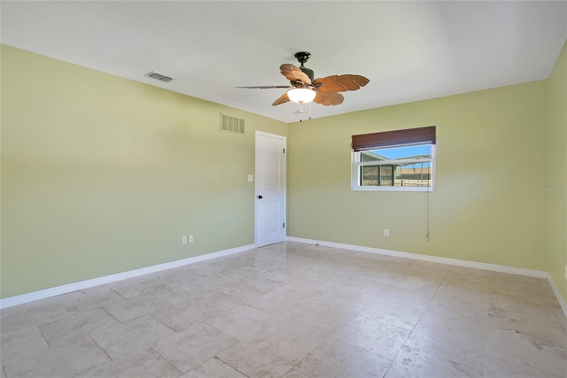 empty room featuring ceiling fan