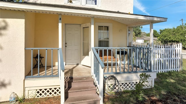 entrance to property with a porch