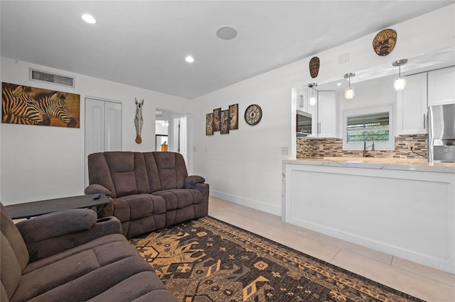 tiled living room with sink