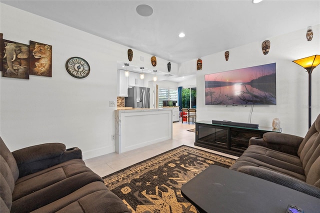 living room with light tile patterned flooring