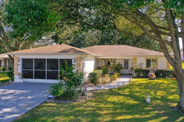 single story home featuring a front yard and a sunroom