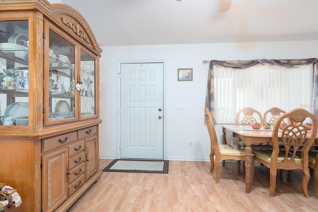 dining area featuring light hardwood / wood-style floors, plenty of natural light, and ceiling fan