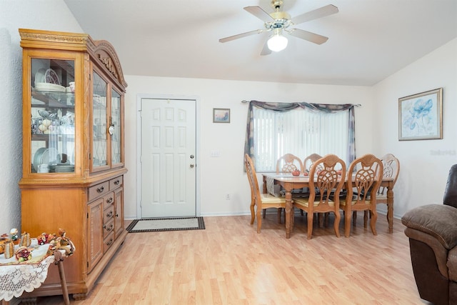 dining area featuring light hardwood / wood-style flooring and ceiling fan