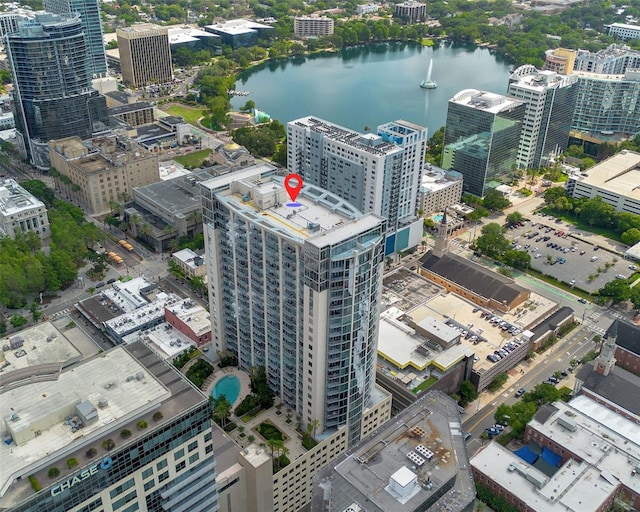 birds eye view of property with a water view