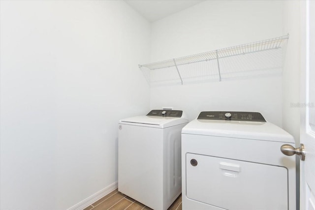 laundry room featuring independent washer and dryer