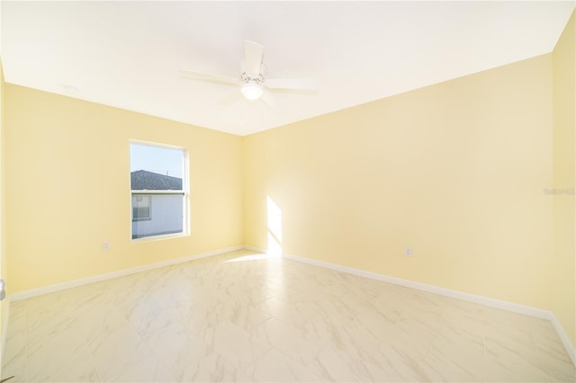 spare room featuring ceiling fan