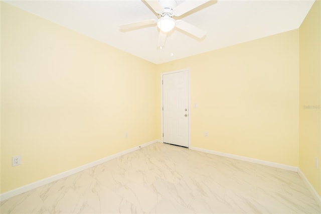 unfurnished room with ceiling fan