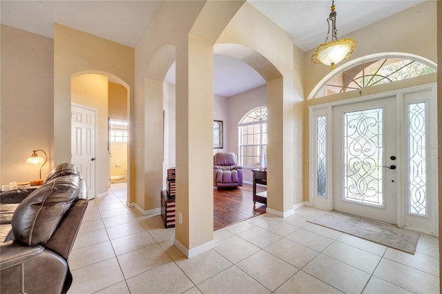 tiled entryway with plenty of natural light