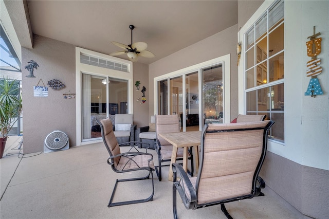 view of patio with ceiling fan