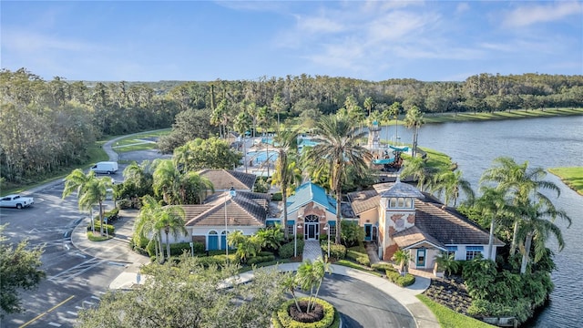 birds eye view of property with a water view