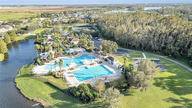 birds eye view of property featuring a water view