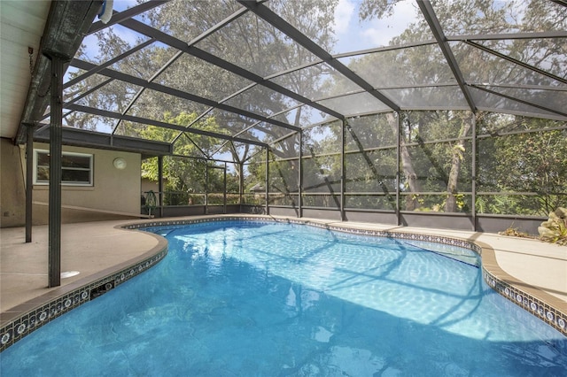 view of pool featuring a patio and a lanai