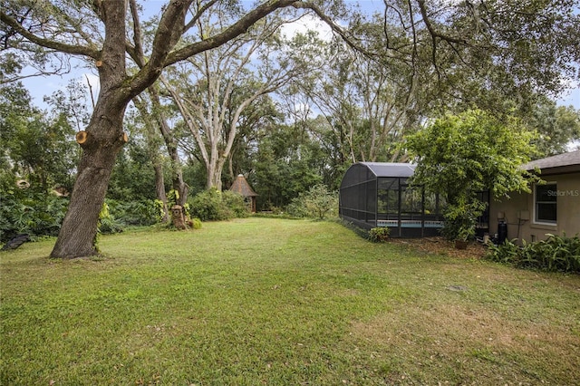 view of yard featuring a lanai