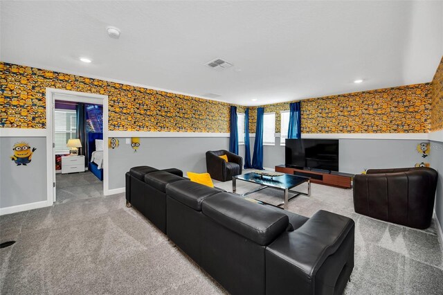 730 Drop Shot Dr, Davenport, FL 33896 - carpeted living room with wallpapered walls, baseboards, and recessed lighting
