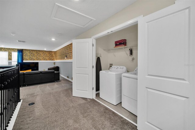 washroom featuring carpet and washing machine and dryer