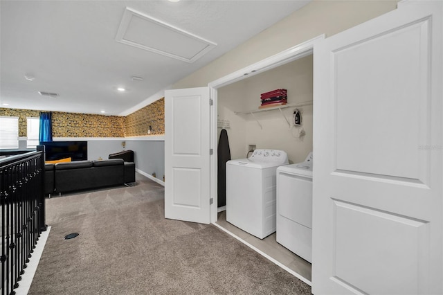 730 Drop Shot Dr, Davenport, FL 33896 - laundry room with washing machine and clothes dryer, attic access, carpet flooring, and recessed lighting