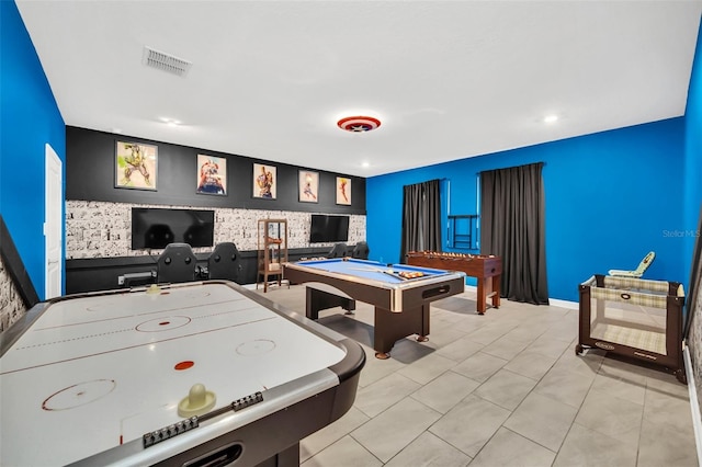 game room with pool table and light tile patterned floors