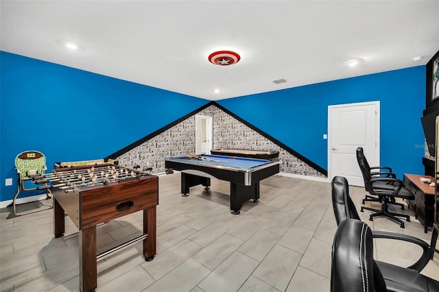 730 Drop Shot Dr, Davenport, FL 33896 - game room with an accent wall, baseboards, pool table, a desk, and brick wall