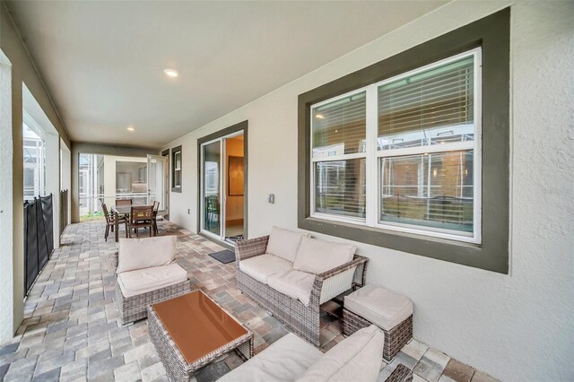 730 Drop Shot Dr, Davenport, FL 33896 - view of patio / terrace with an outdoor hangout area and outdoor dining space