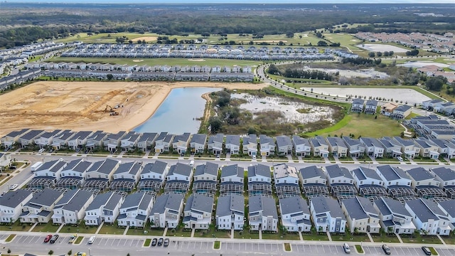730 Drop Shot Dr, Davenport, FL 33896 - aerial overview of property's location with a large body of water and nearby suburban area