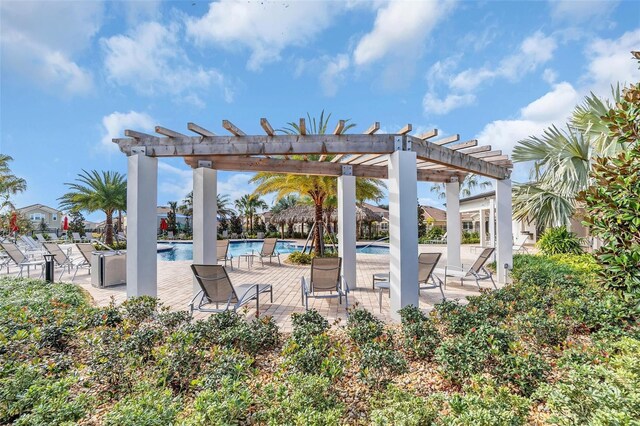 730 Drop Shot Dr, Davenport, FL 33896 - view of patio featuring a pergola and an outdoor pool