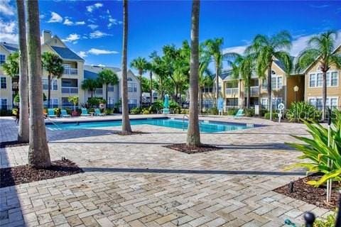 view of swimming pool with a patio area