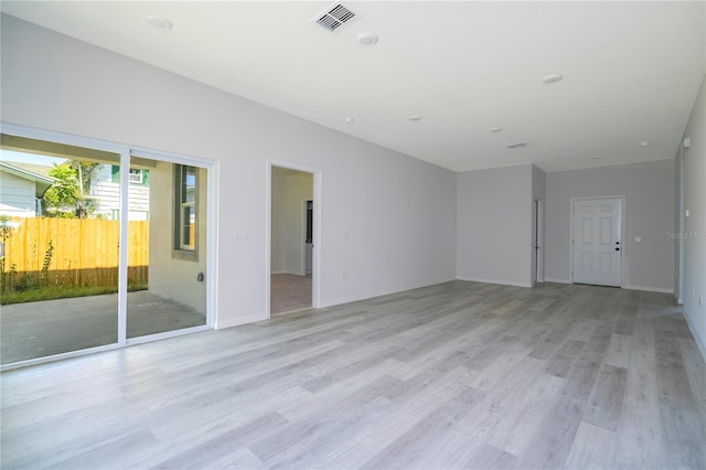 empty room with light wood-type flooring